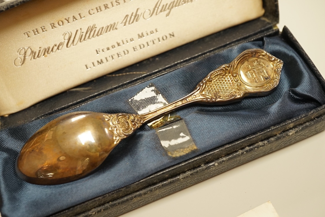 A cased set of six George VI silver teaspoons, James Dixon & Sons, Sheffield, 1948, a cased set of six silver and polychrome enamel coffee spoons and a cased single silver spoon.
